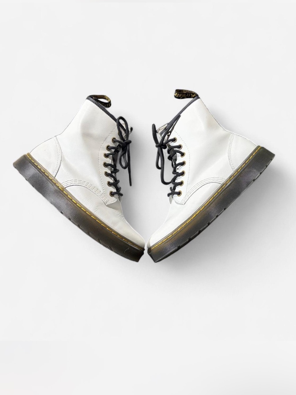 Dr. Martens  women’s White boots.